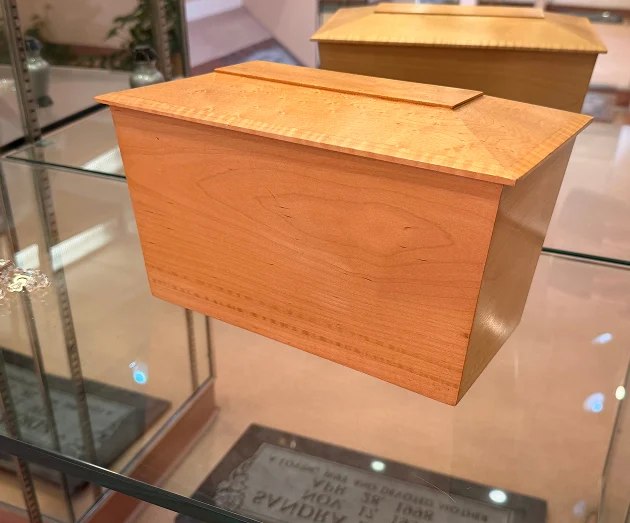Simple light-colored rectangular wooden cremation urn box with a clean finish-1