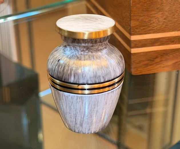 Small brushed metallic cremation urn vase with double polished gold ring accents
